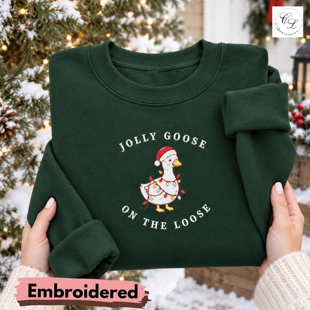 Too Tired to Sleigh | Jolly Goose on the Loose | Embroidered Unisex Heavy Blend™ Crewneck Sweatshirt